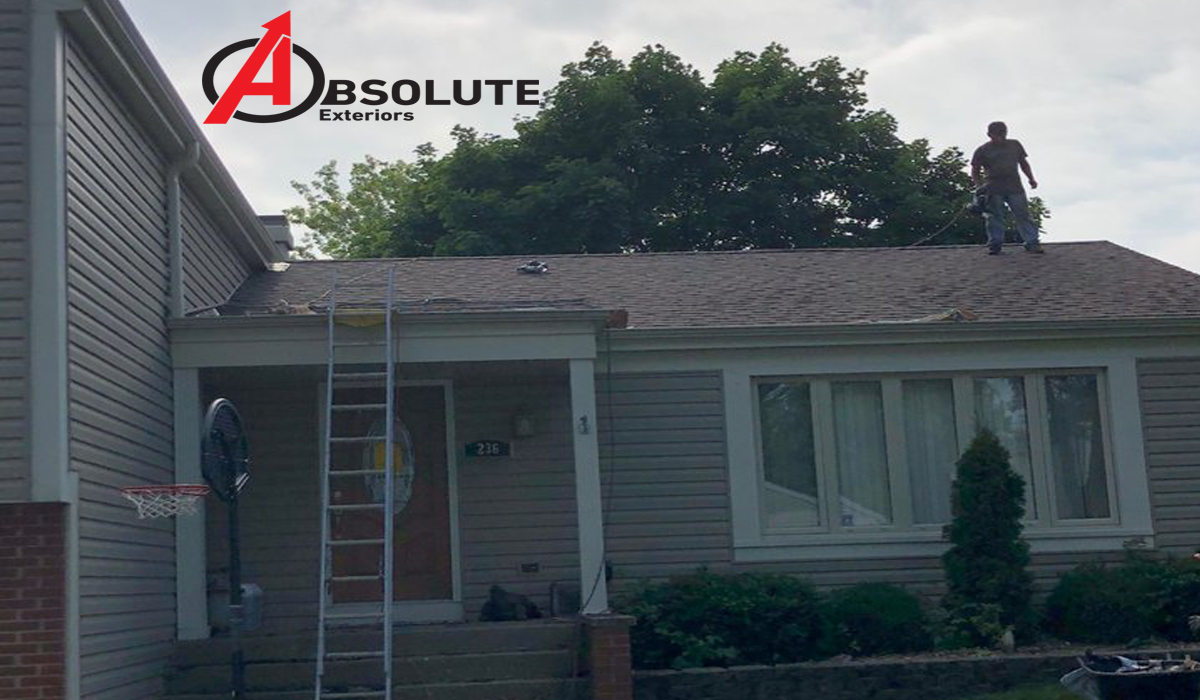 a man reparing a residential roof